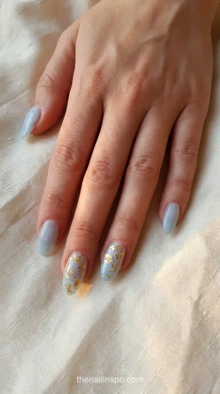 Ice Blue Sheer Almond Nails