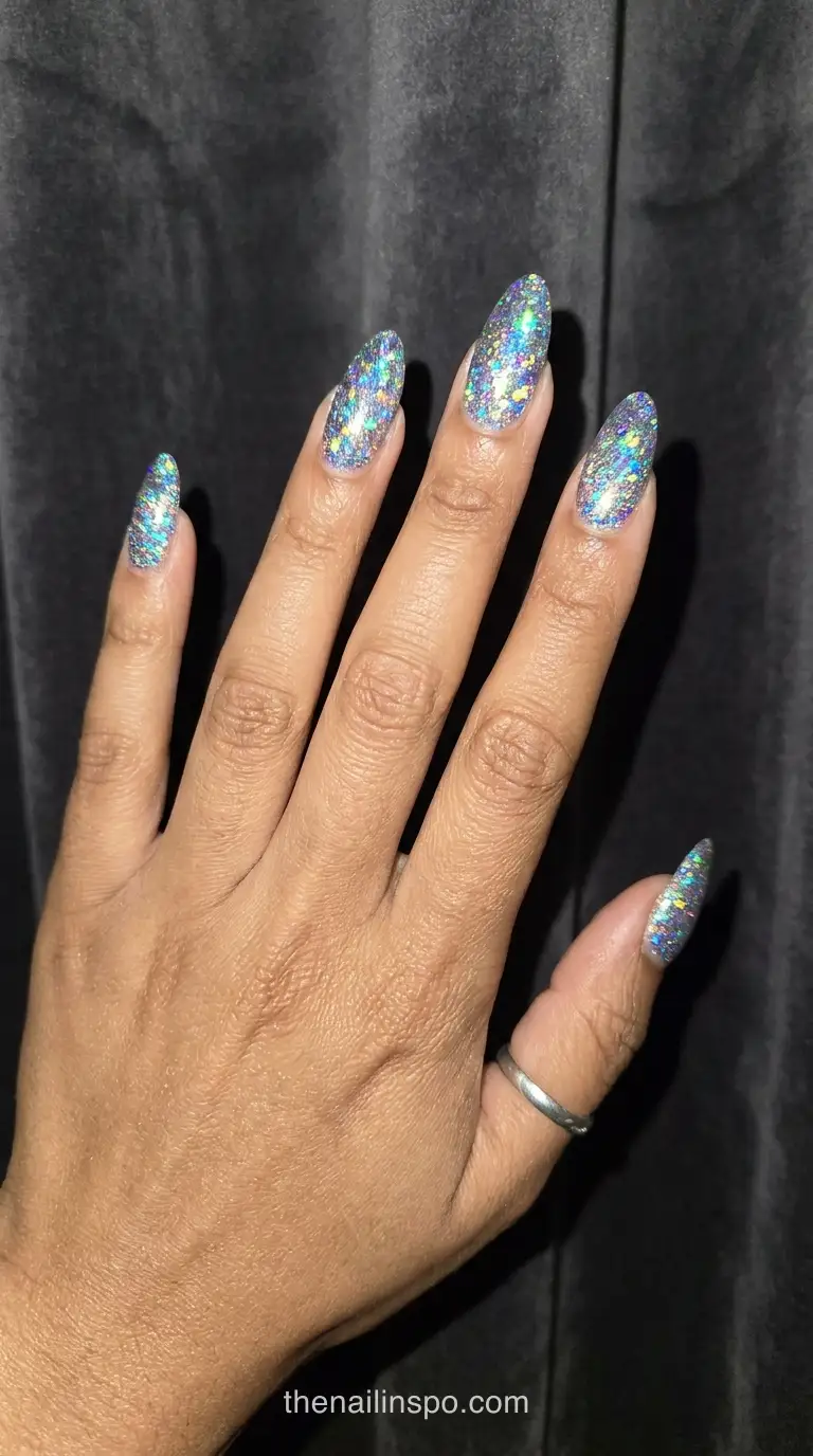 Neon Blue Glitter Almond Nails